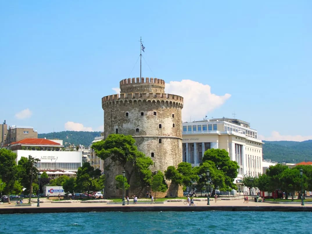 The majestic Heptapyrgion, a Byzantine-era fortress, is a prominent landmark on a hill overlooking the city.