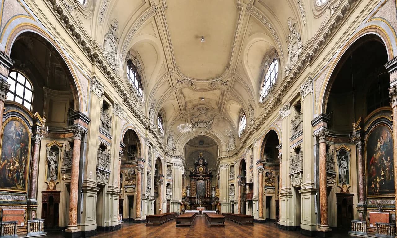 The beautiful and intricate interior of the Basilica of Superga, with its magnificent dome and frescoes.